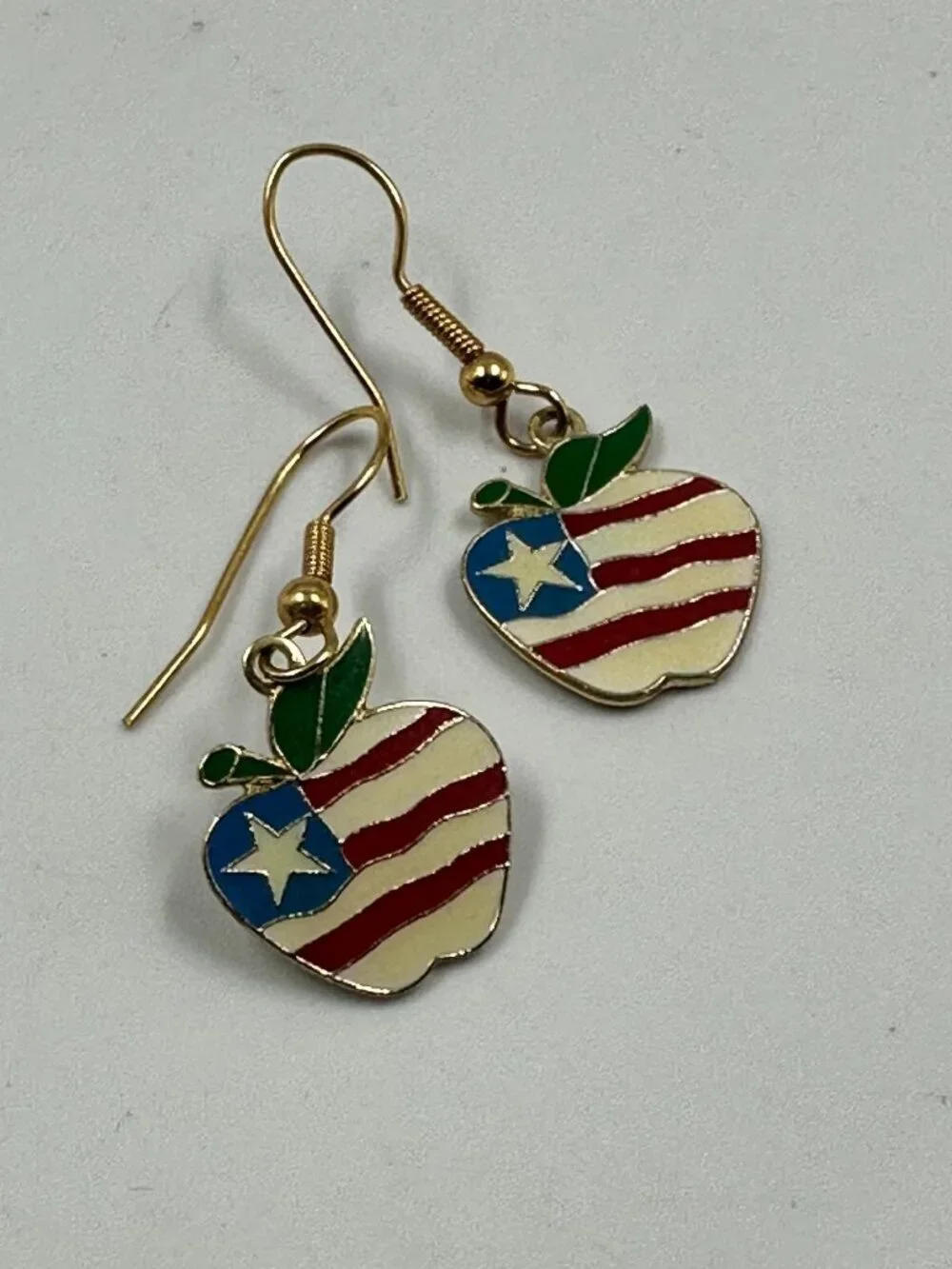 3/$30 Vintage Apple Dangle Earrings Gold Tone Enamel Flag Pattern Red Blue White